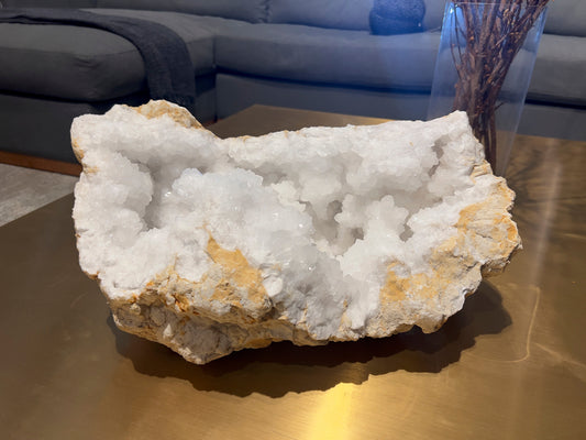 Large White Quartz Geode A striking white quartz geode brings clarity, beauty, and grounding energy into the heart of a couple’s new home.