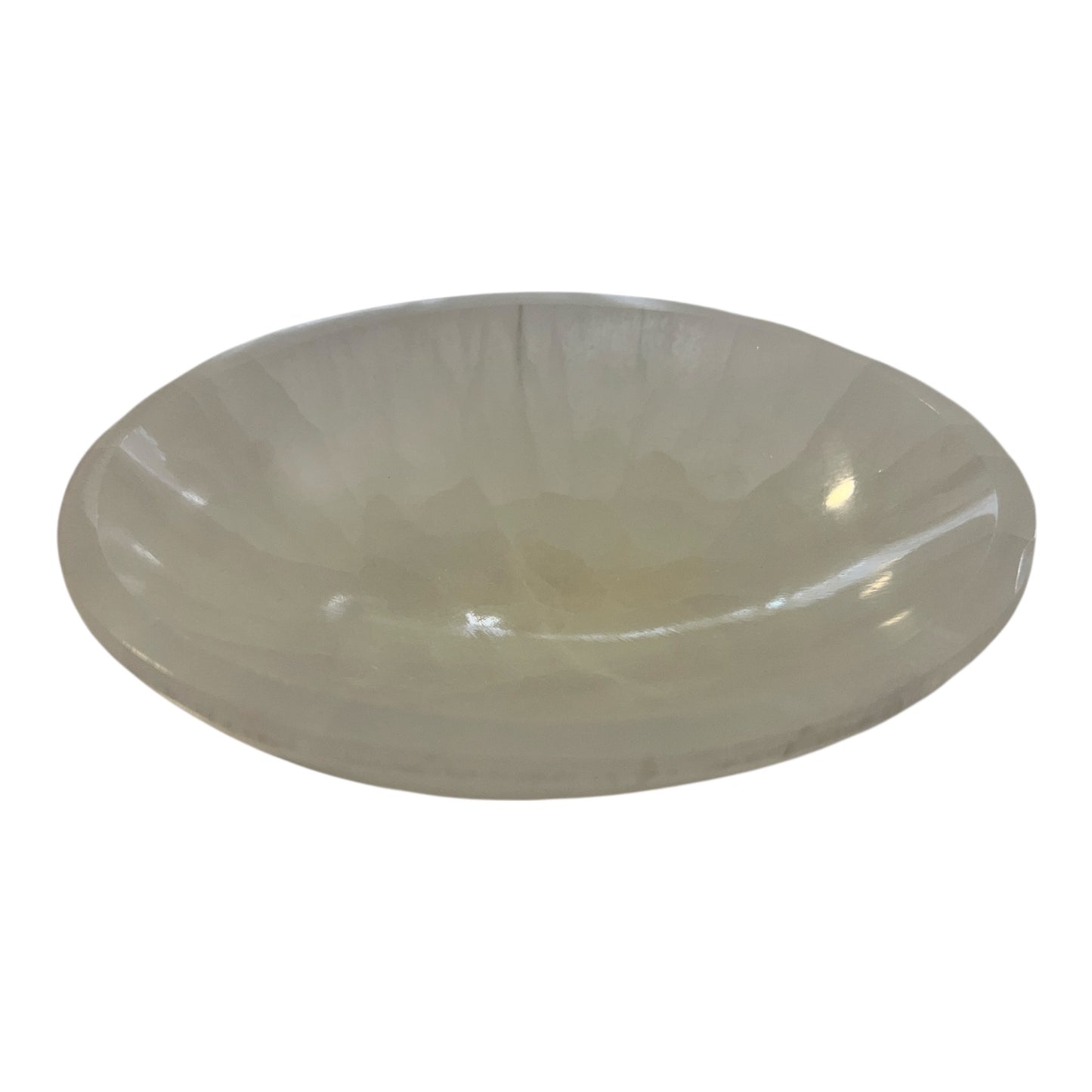 Polished Selenite bowl on a white background