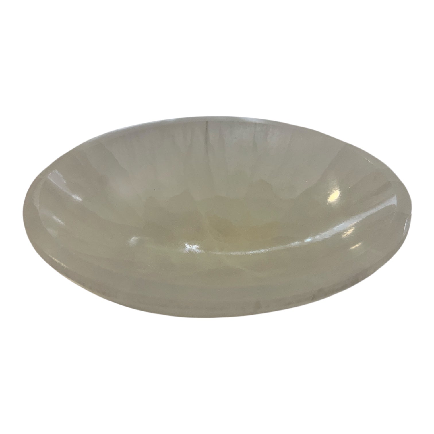 Polished Selenite bowl on a white background