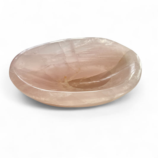 Rose quartz polished crystal bowl on a white background