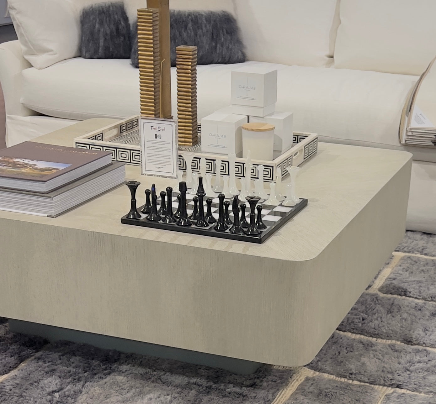 b&w chess set on coffee table