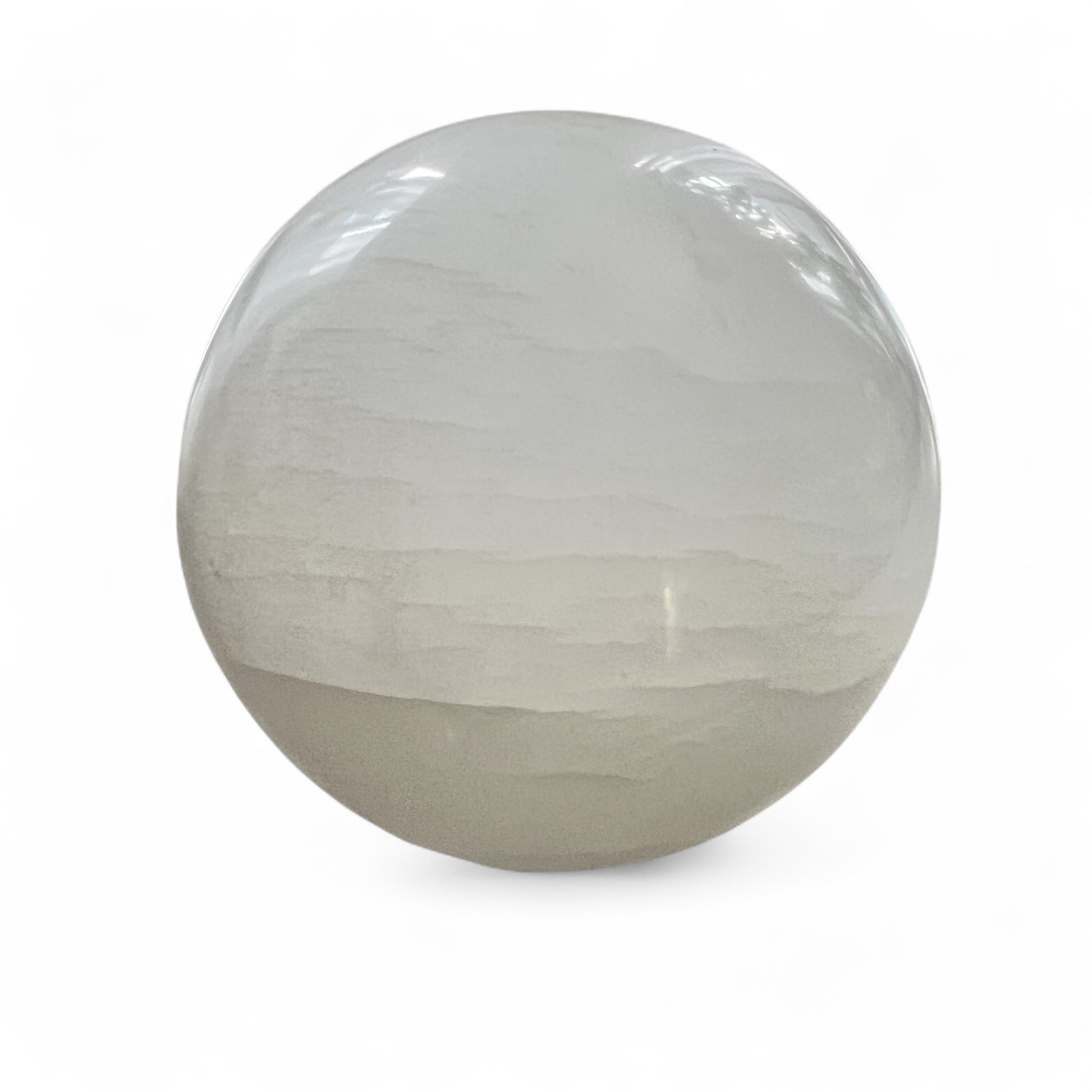 Milky crystal sphere on a white background