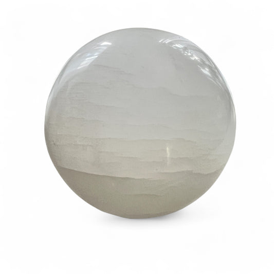Milky crystal sphere on a white background