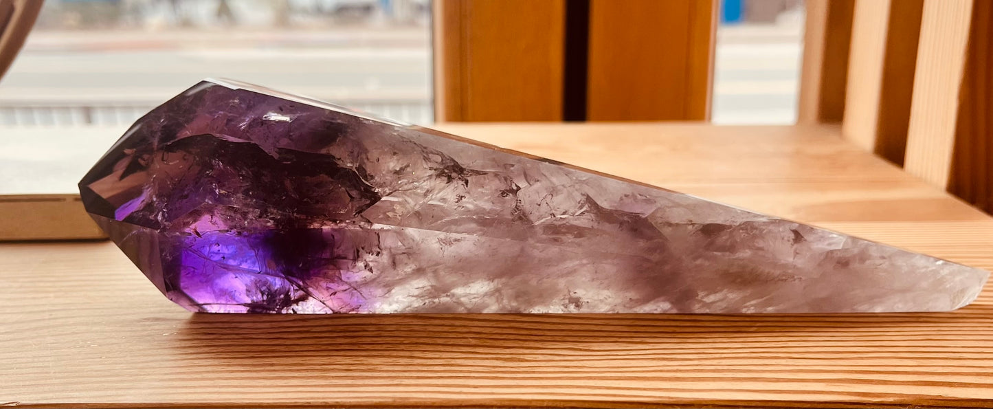 Polished chevron amethyst wand with violet and quartz patterns, elongated crystal sculpture for modern home décor.