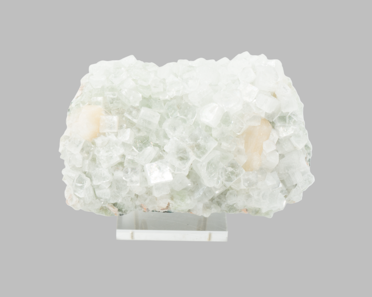 Apophyllite crystal rock on a gray background
