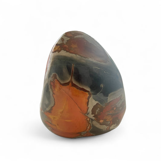 Marbled stone with orange, brown, and gray colors on a white background
