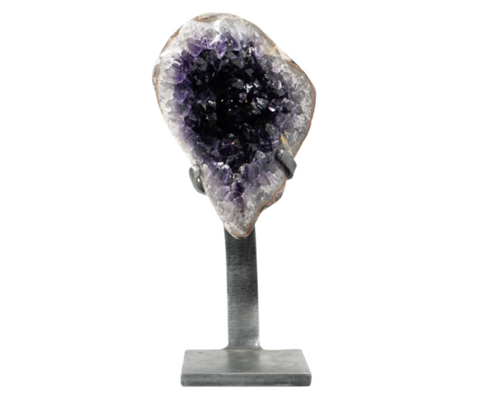 A polished Amethyst crystal displayed on a metal stand.