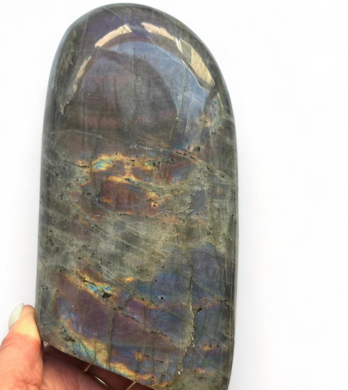 polished labradorite stone with flashes of gold, purple and blue