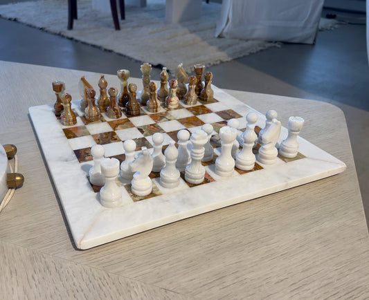 Green and white onyx chess set with polished stone board and hand-carved onyx pieces