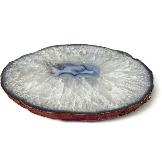 A round agate quartz slab with a smooth, polished surface and a visible blue center.