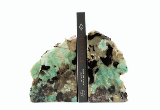 Decorative bookends of natural amazonite and black tourmaline stone design on a white background