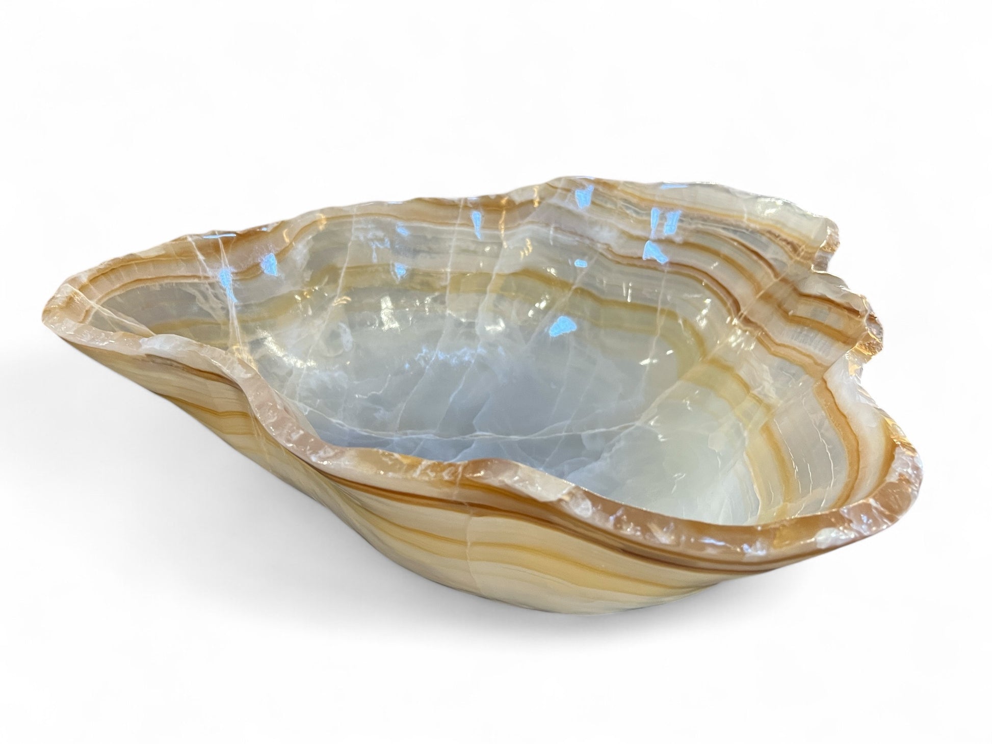 Onyx Bowl Crystal Vessel with Bands of amber and brown stripes on a white background
