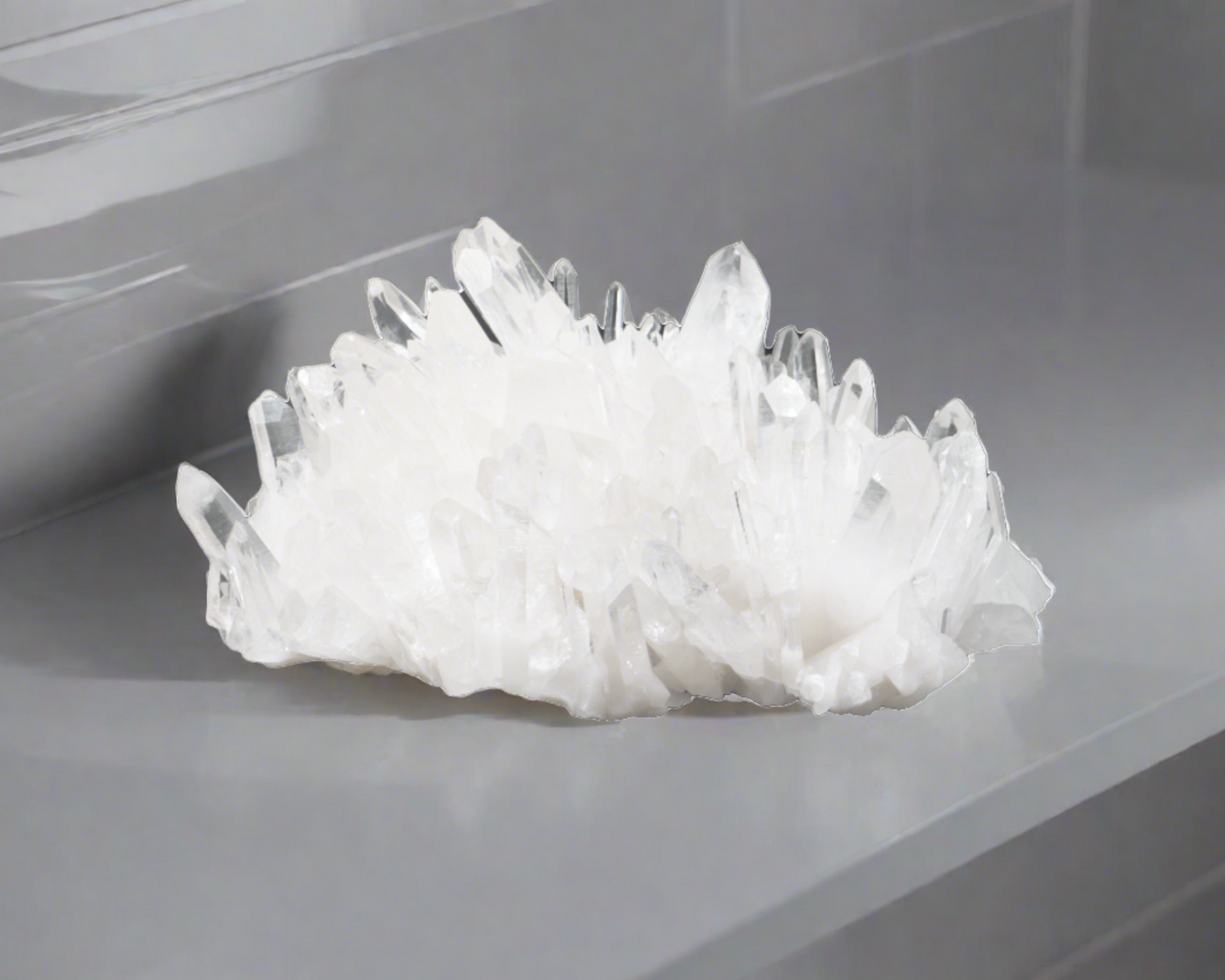 Natural Arkansas quartz cluster formation on a gray surface