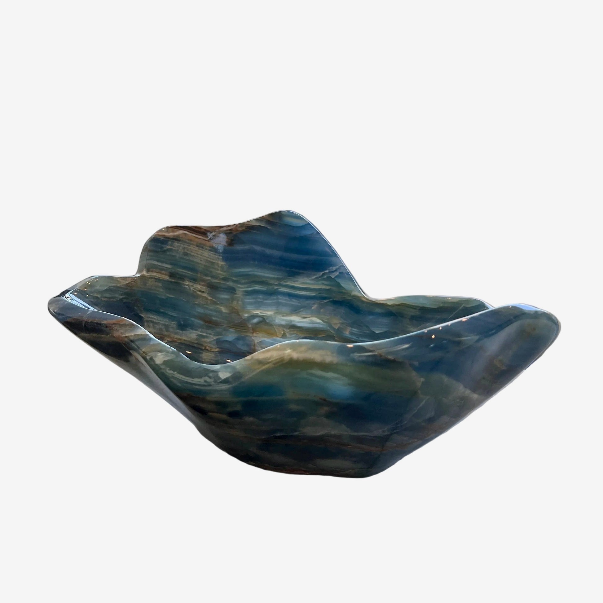 Blue and green ceramic dish on a white background