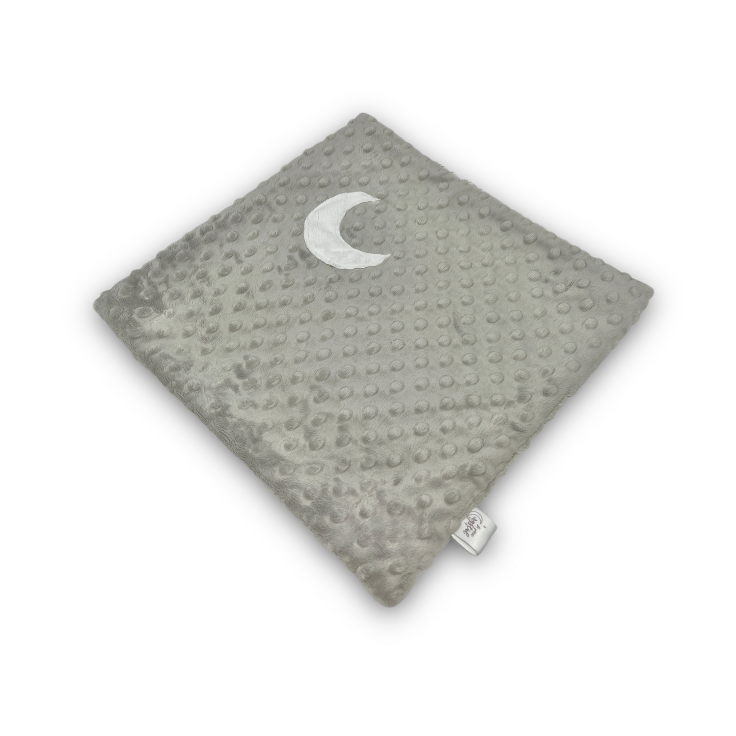Gray textured blanket with a white crescent moon design on a white background