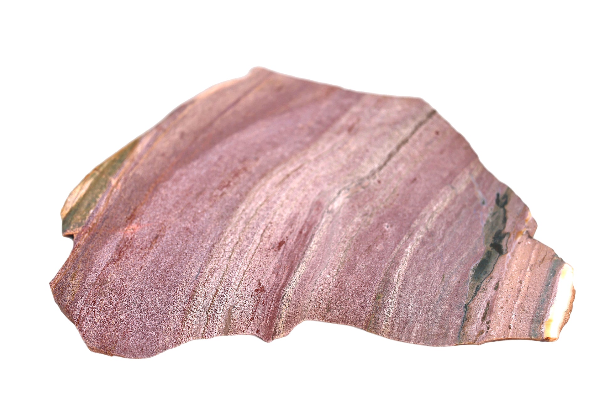 A smooth crystal platter made of Ocean Jasper, with varying shades of pink and purple coloring.