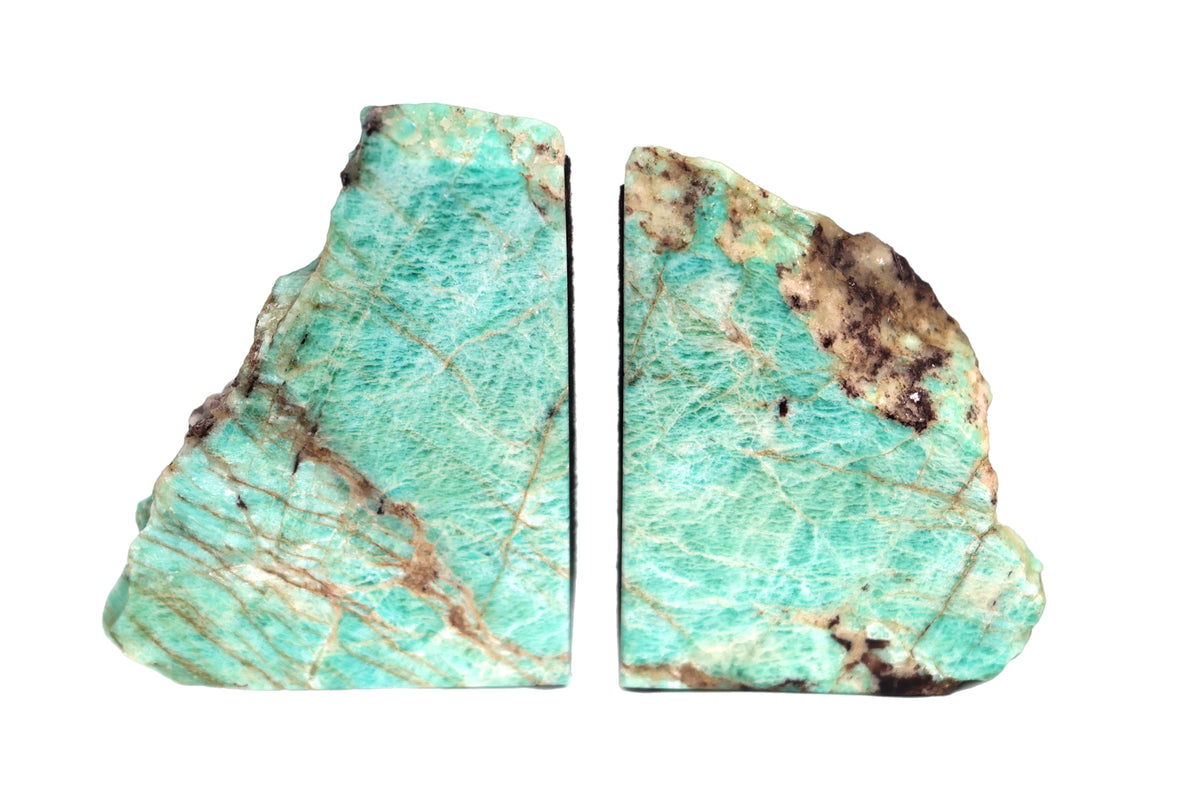 Amazonite bookend with tourmaline and mica, displaying a layered green and white pattern.