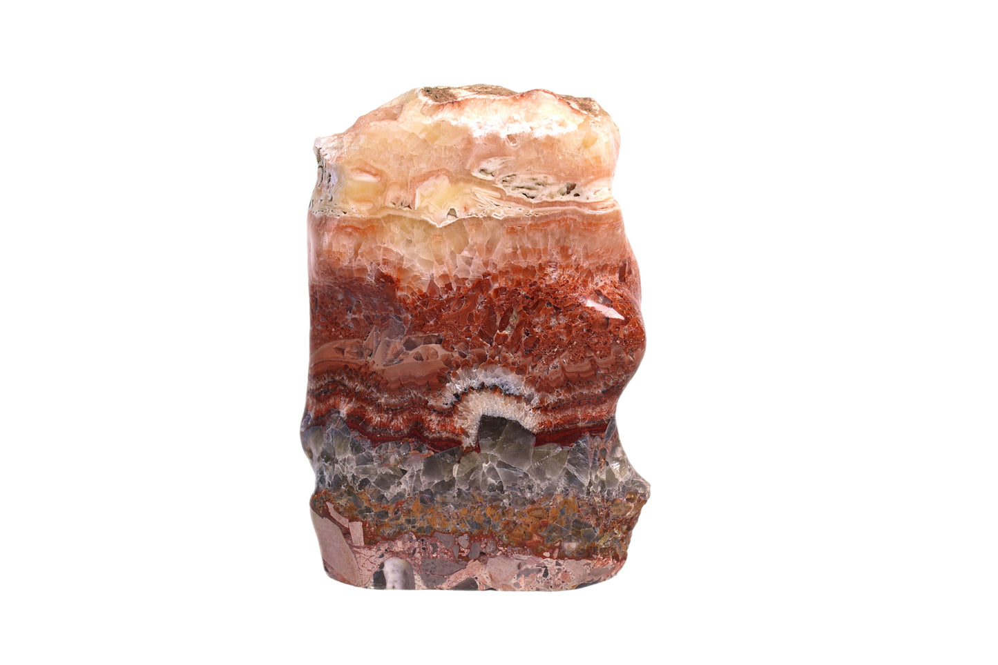 Stone boulder for decor inred banded calcite with swaths of yellow calcite and grey on white background