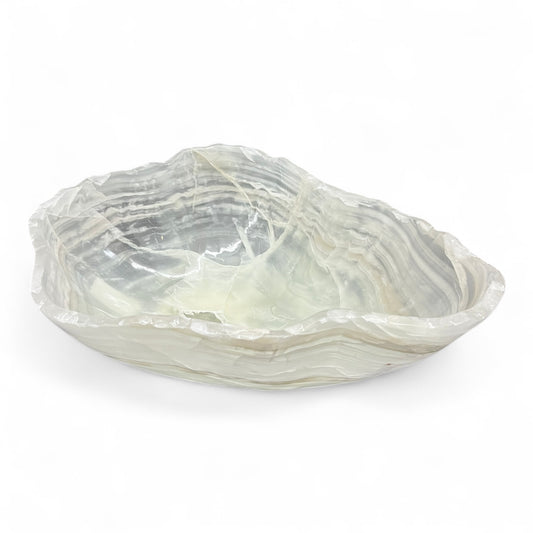 White onyx bow with clear and white veinsl on a white background