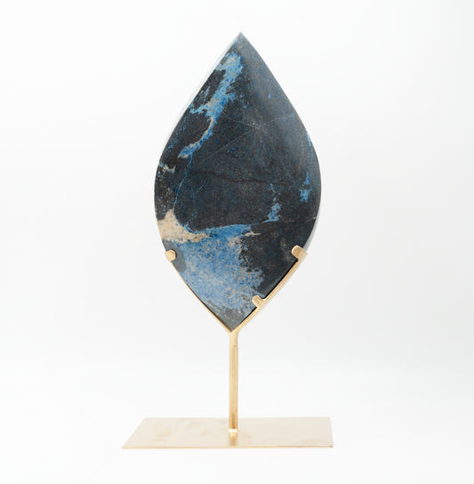 light blue and dark blue double pointed trolleite flame in brass stand