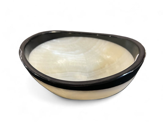 Black-rimmed onyx bowl with white interior on a white background