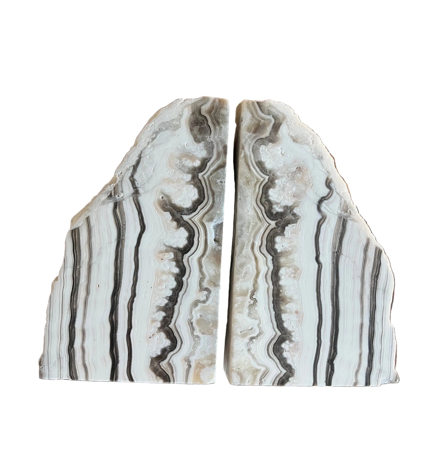 Zebra calcite block bookends with white and charcoal natural striping on white background